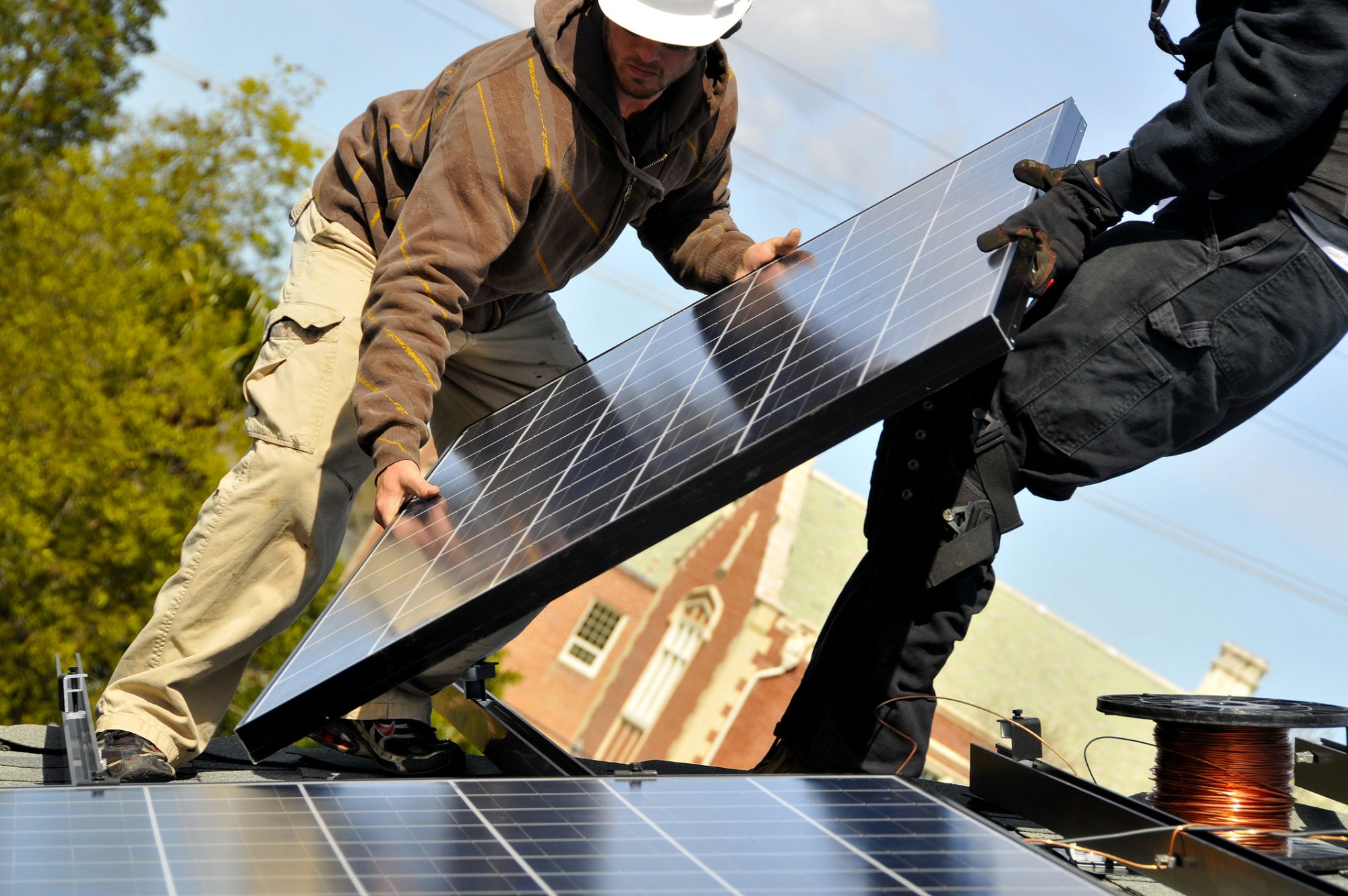 Installing Photovoltaic Solar Panels on Residential Roof